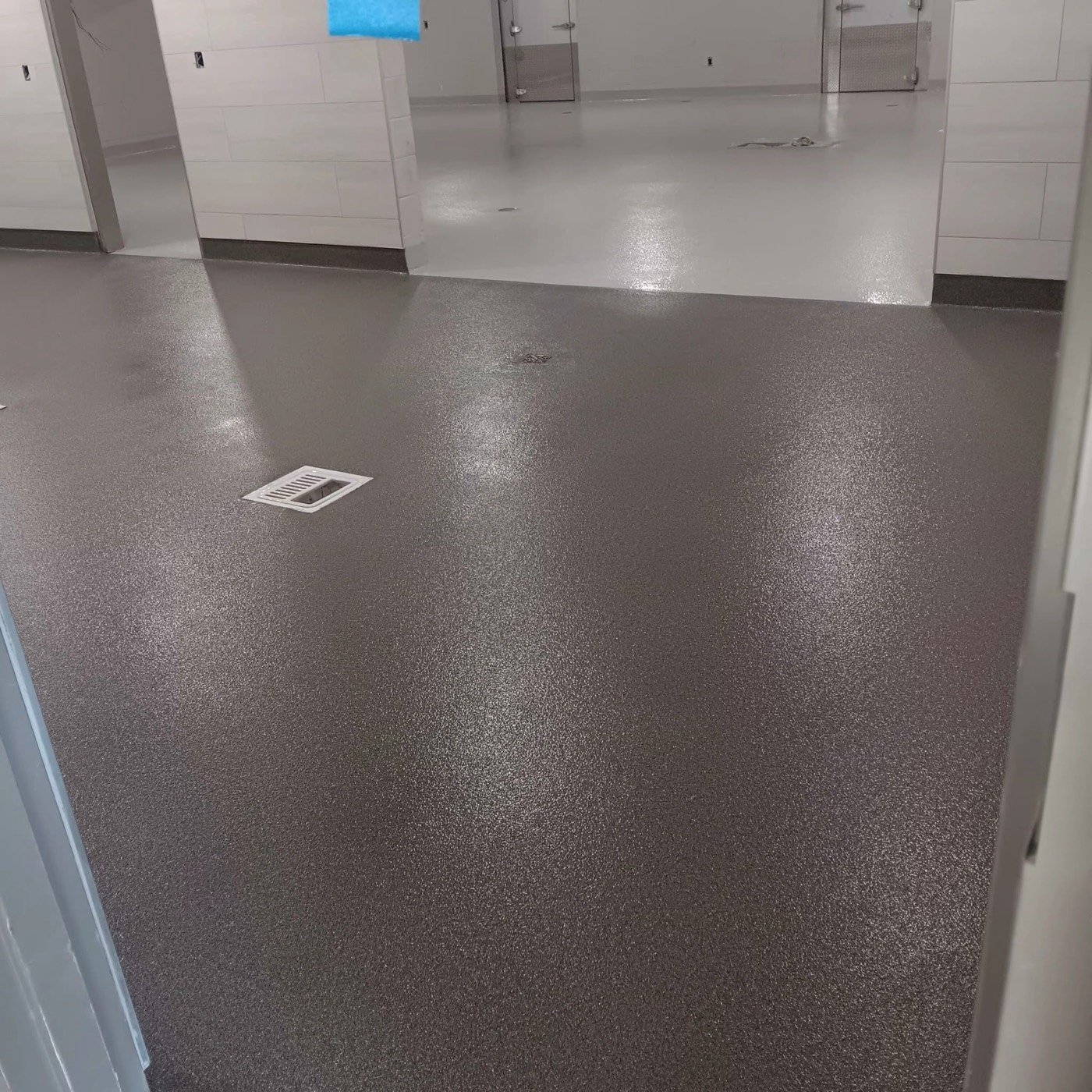 Decorative quartz epoxy floor at Crescent City Elementary